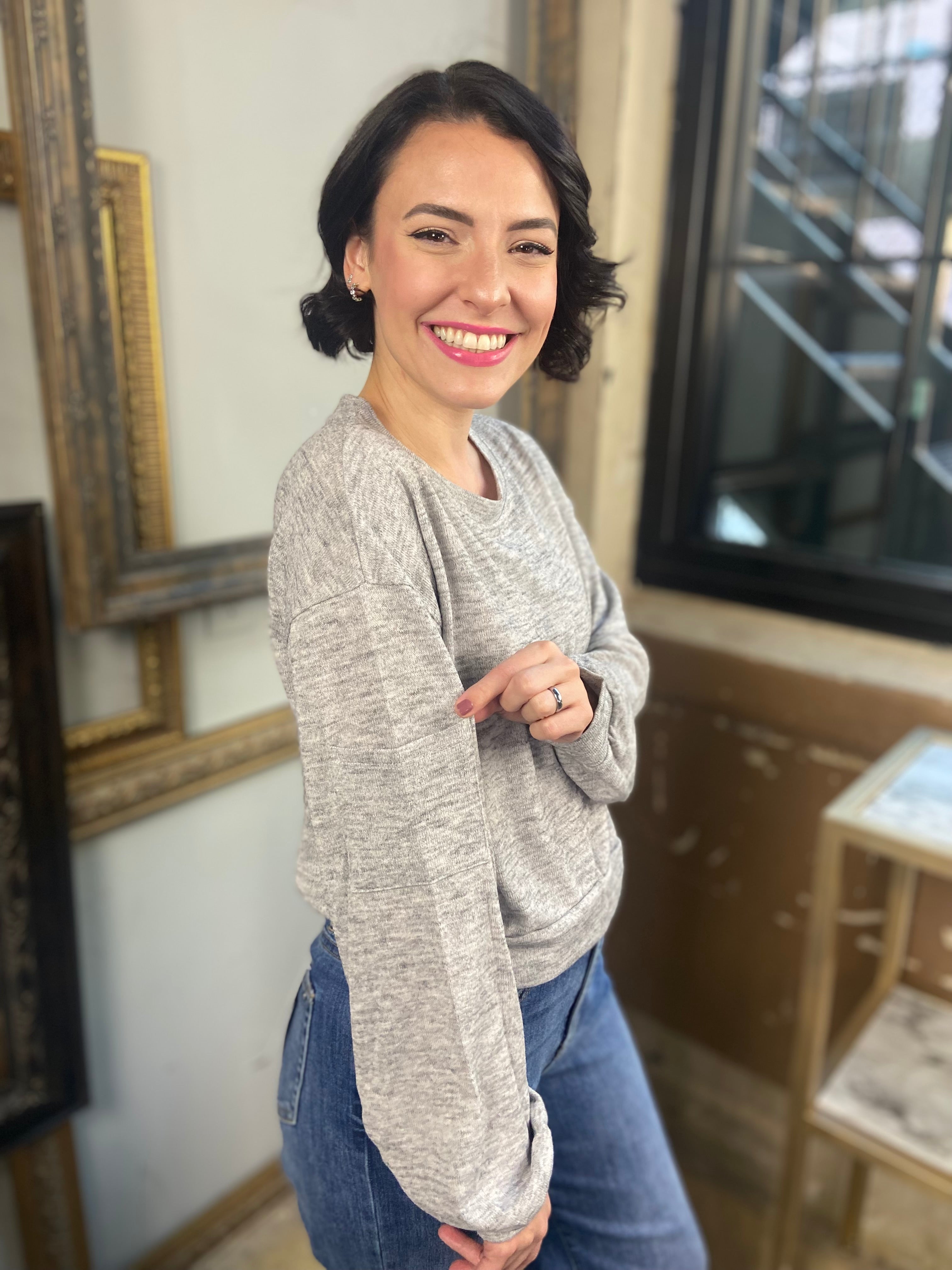 side view of anne light gray spring sweater heather gray sleeve pocket long sleeve crop sweater soft