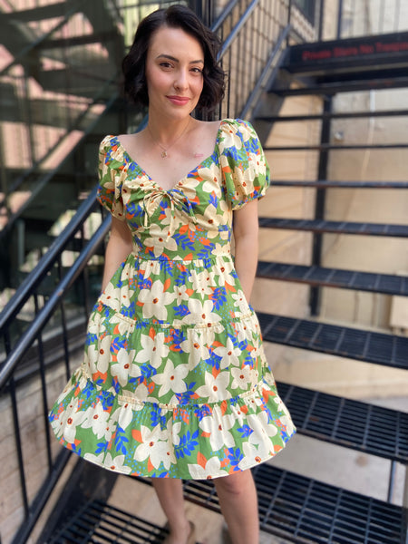 Introducing the Ellie Floral Print Puff Sleeve Mini Dress, your new go-to for effortless style! Perfect for a sunny day out or a weekend brunch, this dress combines a playful floral pattern with chic puff sleeves for a trendy yet feminine touch. Its flattering mini length makes it versatile for any occasion. 

- Breezy floral design for a fresh look 
- Comfortable puff sleeves for added flair 
- Mini length perfect for showcasing your favourite footwear 
- Lightweight fabric ideal for warm weather 
- Easy t