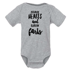 BREAKIN' HEARTS AND BLASTIN' FARTS BABY ONESIE: Black -6 months