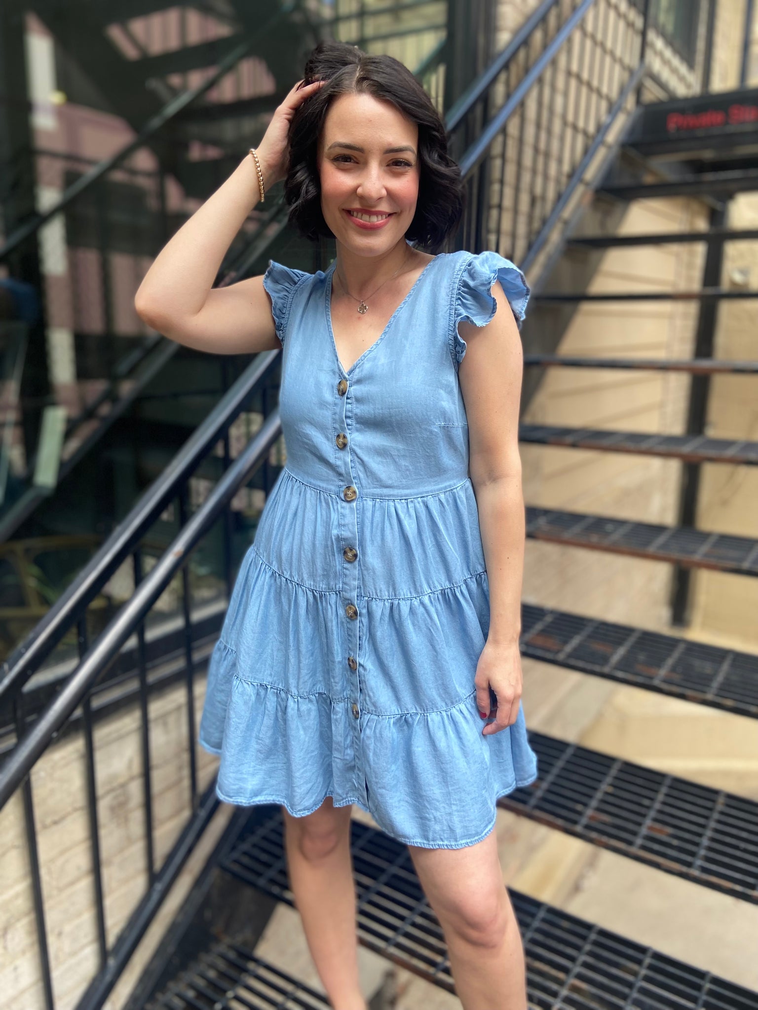 Discover the Aria Chambray Button Up Dress, your perfect companion for effortless style. This dress effortlessly blends classic charm with a modern flair, ensuring you look fabulous for any occasion. Its comfortable fit and breathable fabric make it ideal for everything, from brunch dates to casual outings.

- Elegant chambray fabric for timeless appeal
- Versatile button-up design for easy styling
- Suitable for both casual and semi-formal events
- Perfect for layering throughout the seasons
- Available in