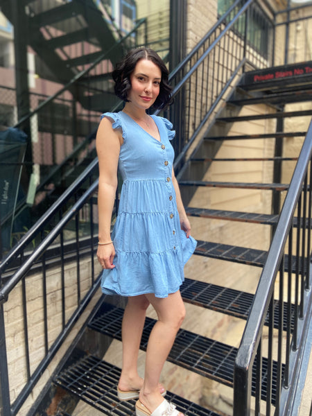 Discover the Aria Chambray Button Up Dress, your perfect companion for effortless style. This dress effortlessly blends classic charm with a modern flair, ensuring you look fabulous for any occasion. Its comfortable fit and breathable fabric make it ideal for everything, from brunch dates to casual outings.

- Elegant chambray fabric for timeless appeal
- Versatile button-up design for easy styling
- Suitable for both casual and semi-formal events
- Perfect for layering throughout the seasons
- Available in