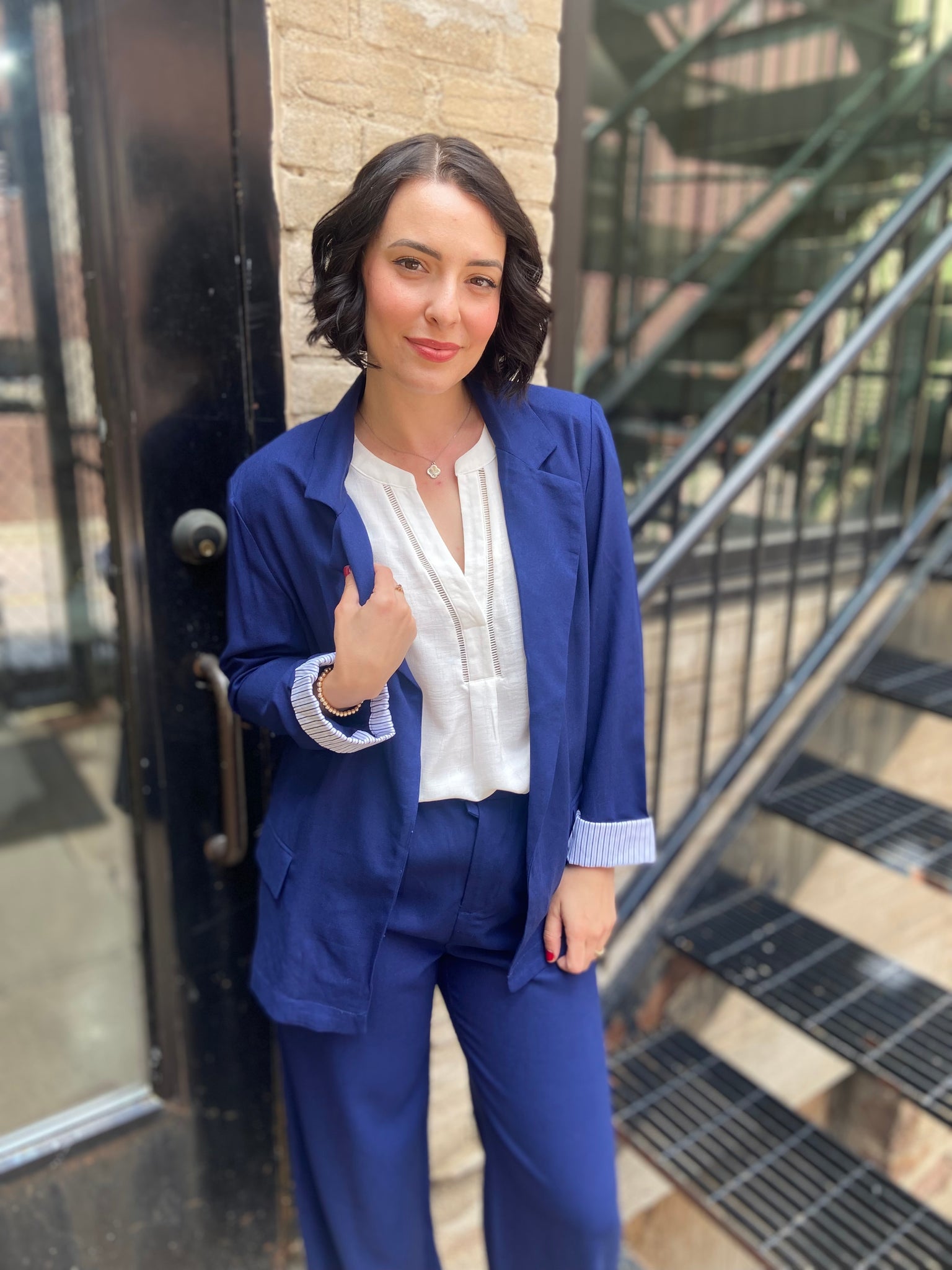 Step into sophistication with the Freya Navy Blue Linen Blazer. Perfect for both work and leisure, this blazer seamlessly elevates any outfit. Its breathable linen fabric ensures comfort, while the tailored fit flatters every figure. 

- Stylish navy blue colour complements various outfits 
- Lightweight and breathable for year-round wear 
- Versatile design ideal for both casual and formal occasions 
- Easy to pair with trousers or dresses for a chic look 
- Machine washable for effortless care 