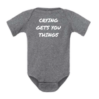 CRYING GETS YOU THINGS BABY ONESIE: Dusty Rose- 12 months