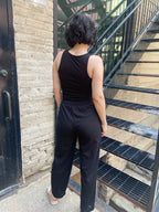 Step into effortless style with the Alice Black Crepe High Waist Pants. Designed for both comfort and chicness, these pants feature a flattering straight leg and a stylish self-tie belt, perfect for showcasing your fashion sense. 

- High waist with a self-tie belt for a customised fit 
- Textured knit crepe for added style 
- Convenient pockets for practicality 
- Relaxed straight fit for all-day comfort 
- Elastic back waistband for ease of movement 

