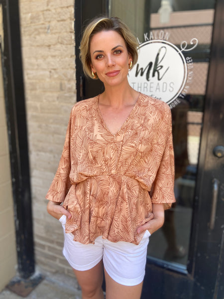 Saige Peach Tropical Peplum Top