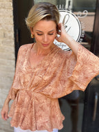 Saige Peach Tropical Peplum Top