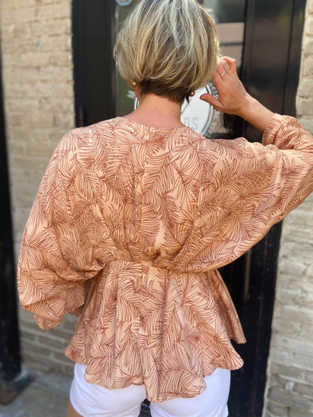 Saige Peach Tropical Peplum Top