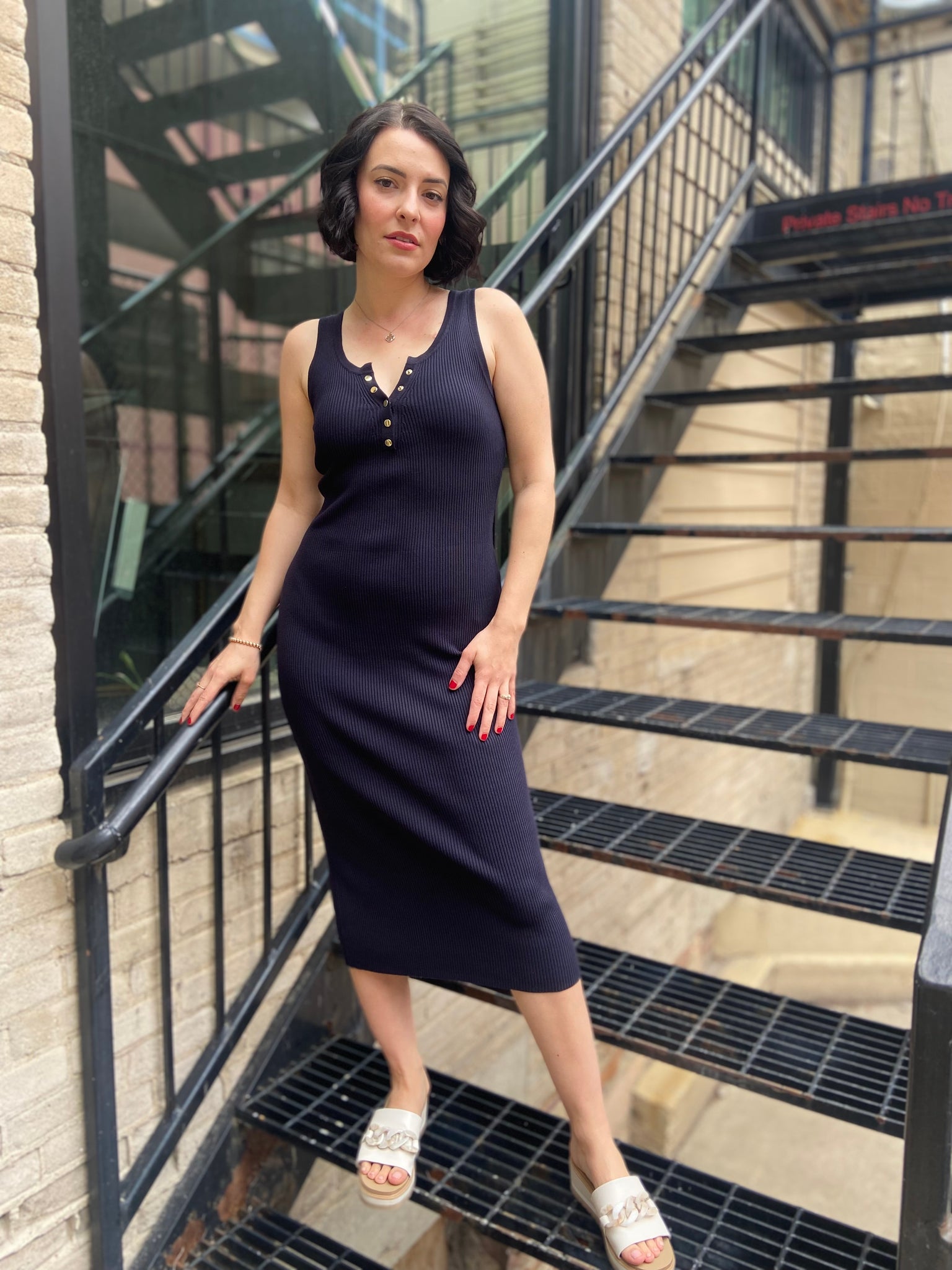 Introducing the Marlowe Navy Ribbed Midi Dress, your go-to piece for effortless style. This dress combines comfort and elegance, making it perfect for any occasion. The ribbed texture flatters every silhouette, while the midi length adds a touch of sophistication. Dress it up with heels or keep it casual with sneakers—versatility is its middle name! 

- Flattering ribbed design 
- Classic navy colour for easy pairing 
- Perfect for day or night wear 
- Easy to style for all occasions 
- Comfortable fit for 