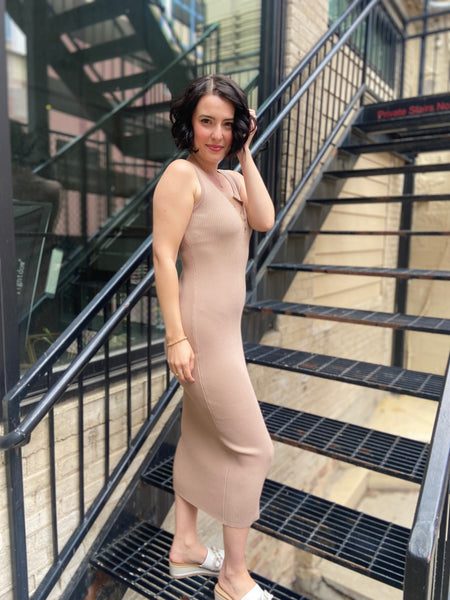Introducing the Marlowe Taupe Ribbed Midi Dress, your new go-to for effortless style. This dress combines comfort and sophistication, featuring a flattering ribbed fabric that hugs your curves in all the right places. Dress it up with heels for a night out or keep it casual with sneakers—it's versatile enough for any occasion. 

- Flattering midi length 
- Soft ribbed texture for ultimate comfort 
- Perfect for layering or wearing alone 
- Easy to style for any event 