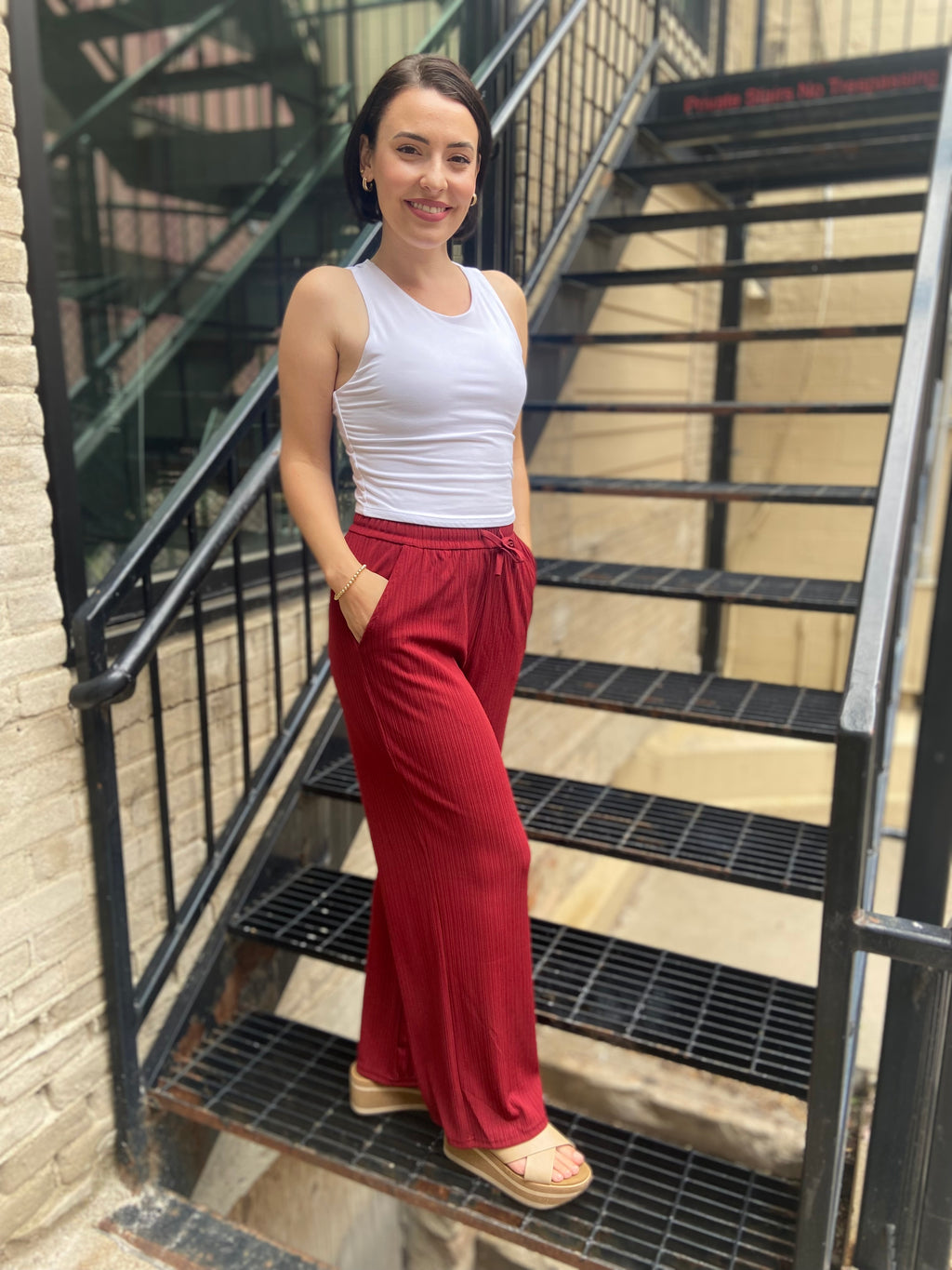 Step into style and comfort with the Jodie Red Ribbed Drawstring Pants. These pants are effortlessly chic and perfect for any occasion. With an elastic waist for a custom fit and a flattering wide-leg silhouette, you’ll feel fabulous every time you wear them. Plus, the convenient pockets ensure your essentials are always within reach.

- Elastic waist for ultimate comfort
- Flattering wide-leg design
- Handy pockets for your essentials
- Soft ribbed fabric for a luxurious feel
- Care: Hand wash cold and lin