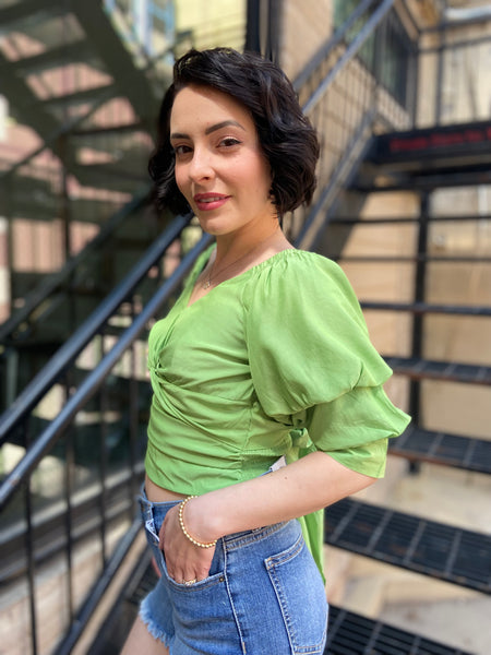 Introducing the Riley Green Reversible Puff Sleeve Top—your new go-to for effortless style. This trendy top features chic puff sleeves and a versatile design that lets you flaunt two looks in one. Whether you’re dressing up for a night out or keeping it casual, this top has got you covered. 

- Reversible design for versatile styling 
- Trendy puff sleeves for a touch of elegance 
- Perfect for any occasion—dress it up or down 
- Comfortable and flattering fit 
- Easy to pair with jeans, skirts, or shorts 