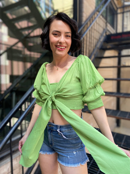 Introducing the Riley Green Reversible Puff Sleeve Top—your new go-to for effortless style. This trendy top features chic puff sleeves and a versatile design that lets you flaunt two looks in one. Whether you’re dressing up for a night out or keeping it casual, this top has got you covered. 

- Reversible design for versatile styling 
- Trendy puff sleeves for a touch of elegance 
- Perfect for any occasion—dress it up or down 
- Comfortable and flattering fit 
- Easy to pair with jeans, skirts, or shorts 