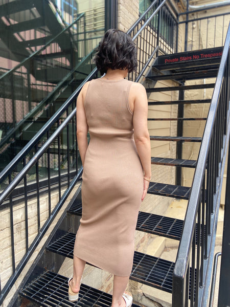 Introducing the Marlowe Taupe Ribbed Midi Dress, your new go-to for effortless style. This dress combines comfort and sophistication, featuring a flattering ribbed fabric that hugs your curves in all the right places. Dress it up with heels for a night out or keep it casual with sneakers—it's versatile enough for any occasion. 

- Flattering midi length 
- Soft ribbed texture for ultimate comfort 
- Perfect for layering or wearing alone 
- Easy to style for any event 