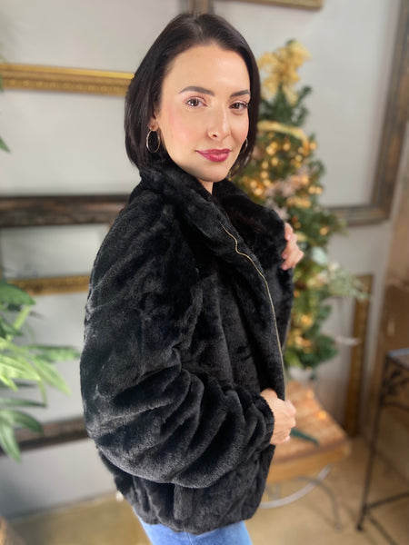 Side view of black fur jacket