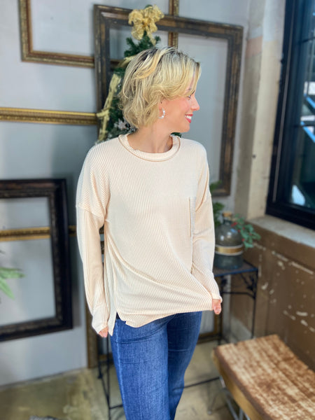 Cream colored corded sweatshirt with front chest pocket from Zenana