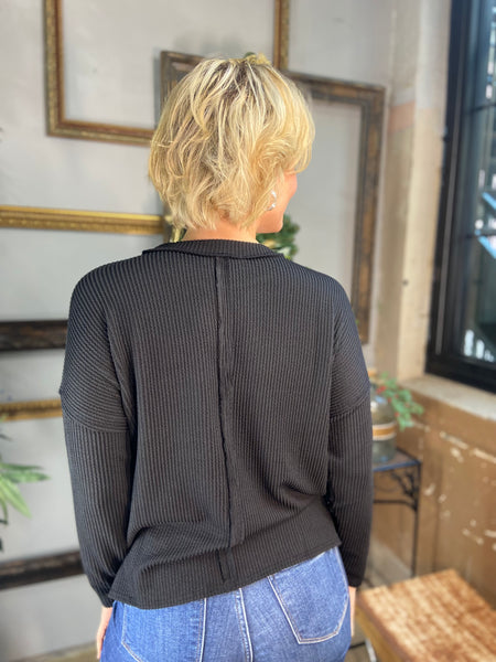 Back view of a Black corded sweatshirt from Zenana