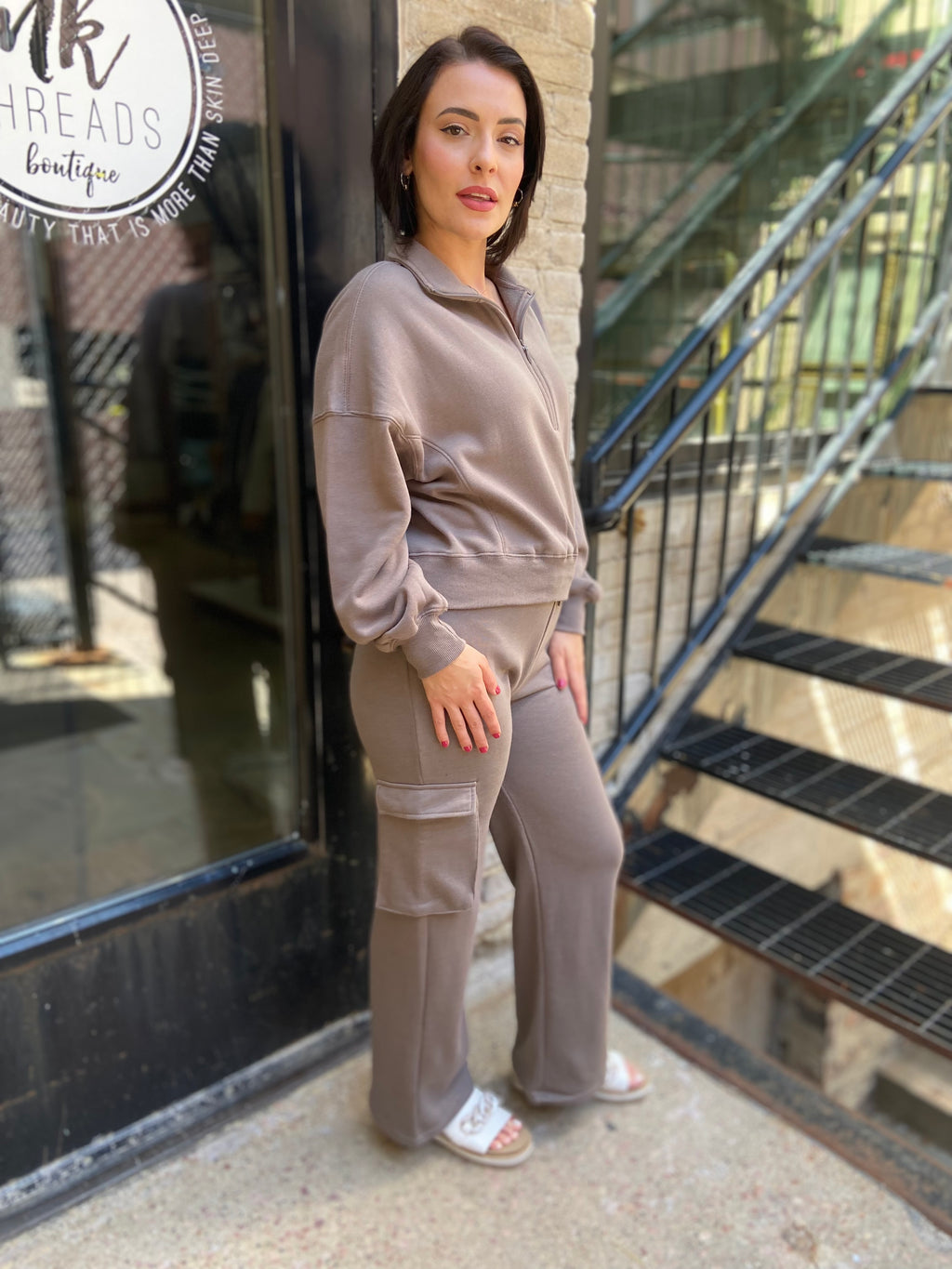 Side view of mocha colored Cropped Fleece Pullover Sweatshirt with half zip neck