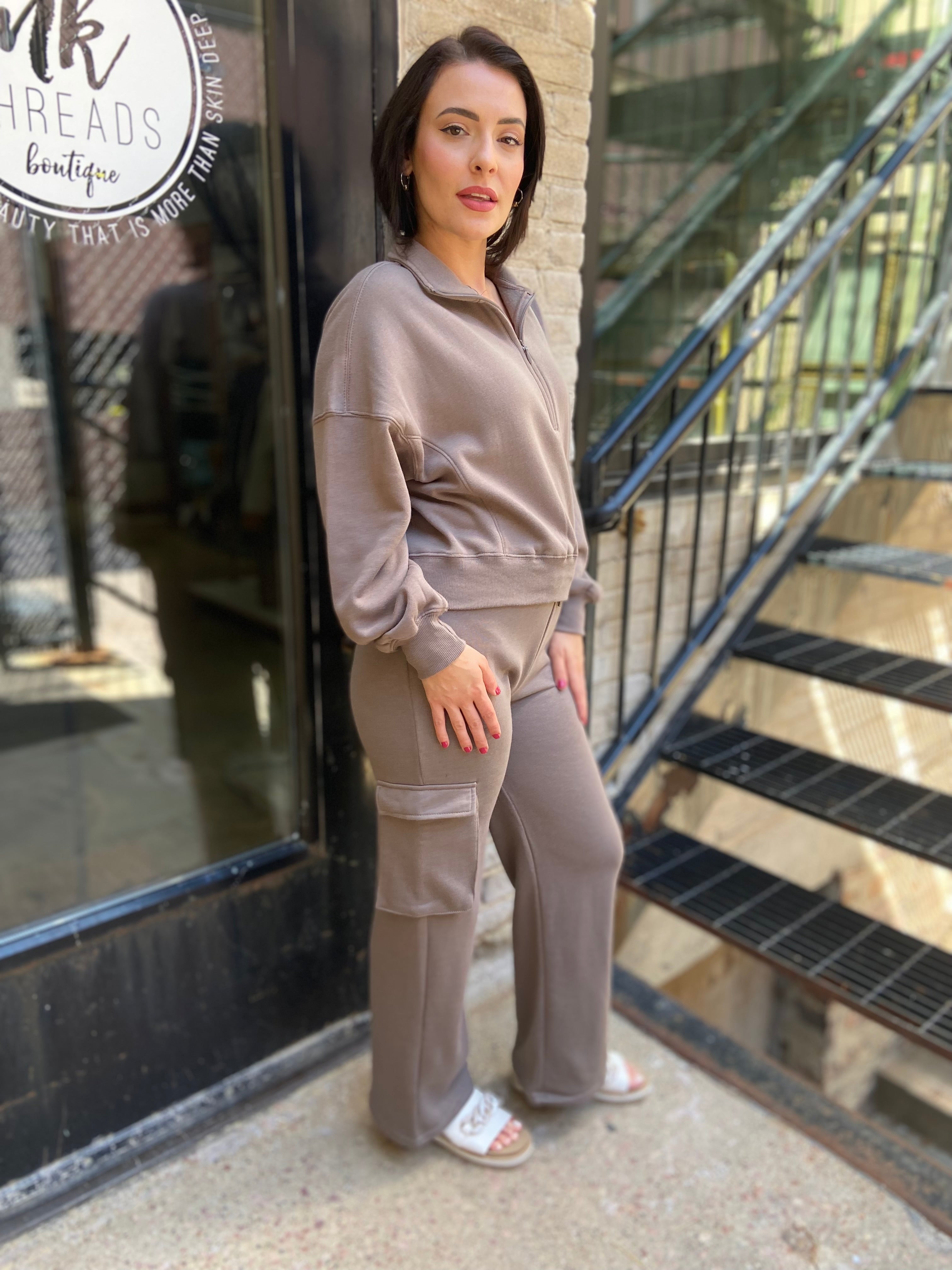 Side view of mocha colored Cropped Fleece Pullover Sweatshirt with half zip neck
