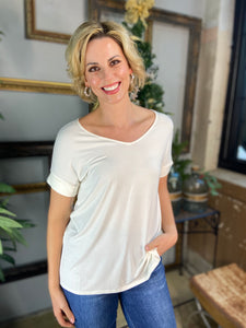 Ivory short cuffed sleeve top with wide v neck