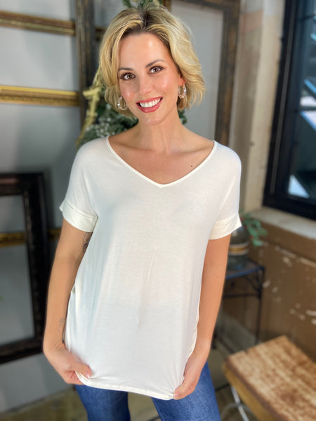 Ivory short cuffed sleeve top with wide v neck