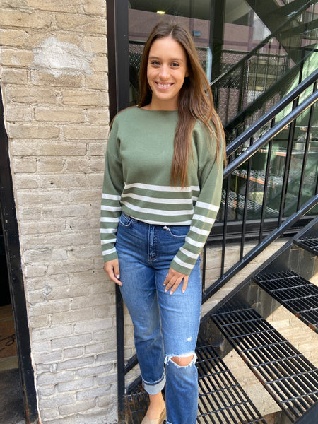 Green & Ivory Striped Sweater paired with jeans