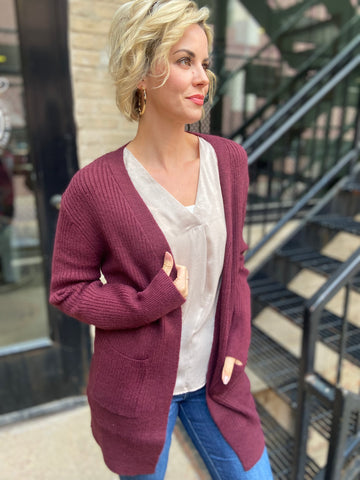 Burgundy colored cardigan sweater