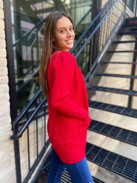 Side view of red cardigan sweater