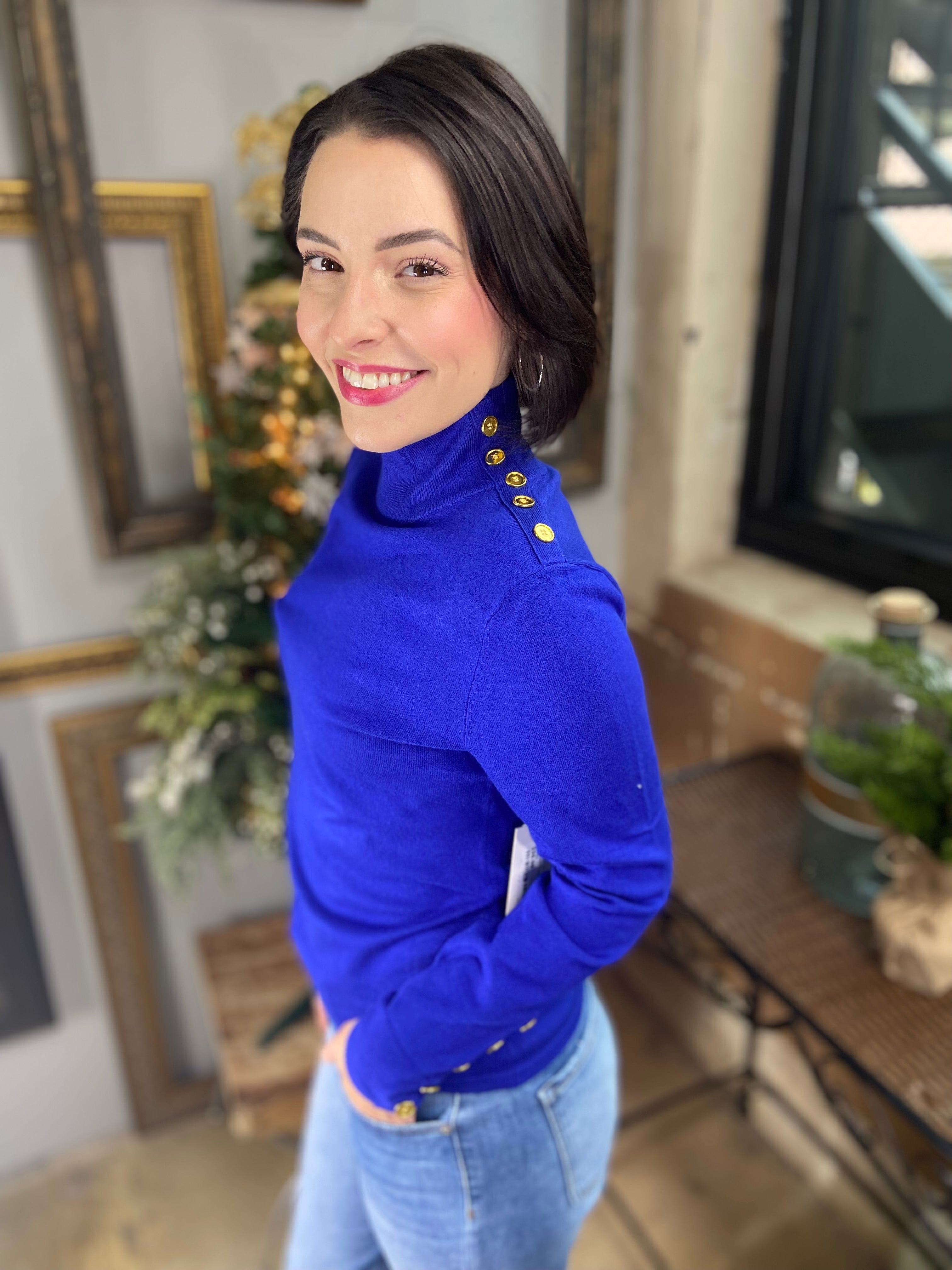 Royal blue sweater with gold buttons