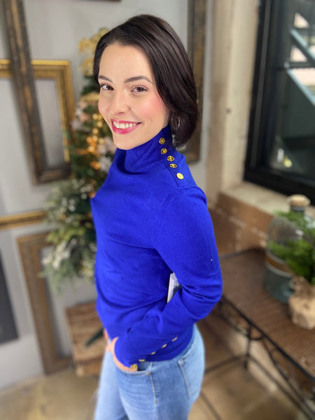 Royal blue sweater with gold buttons