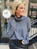 Charcoal Turtle Neck Sweater with a black pleather skirt