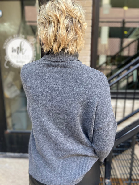 Back view of charcoal sweater