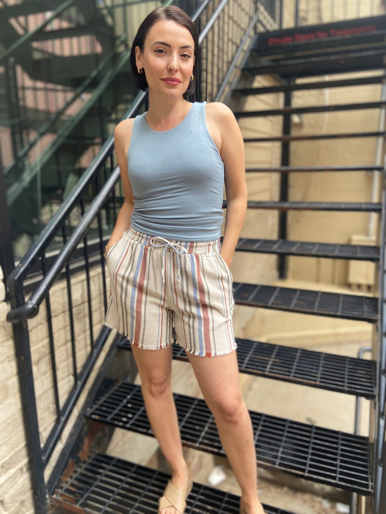 Meet your new summer favourite: the Eden Striped Linen Shorts. Designed for those sunny, laid-back days, these shorts offer a comfy drawstring waist and vibrant stripes that effortlessly elevate your casual look. Ideal for lounging or exploring, they embody that relaxed vibe you crave.

- Elastic waistband with front tie for adjustable fit
- Functional side pockets for added convenience
- Made from breathable 52% linen and 48% viscose
- Lightweight fabric keeps you cool all day
- Unique novelty wash process