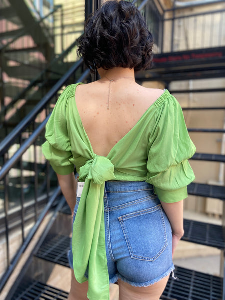 Introducing the Riley Green Reversible Puff Sleeve Top—your new go-to for effortless style. This trendy top features chic puff sleeves and a versatile design that lets you flaunt two looks in one. Whether you’re dressing up for a night out or keeping it casual, this top has got you covered. 

- Reversible design for versatile styling 
- Trendy puff sleeves for a touch of elegance 
- Perfect for any occasion—dress it up or down 
- Comfortable and flattering fit 
- Easy to pair with jeans, skirts, or shorts 