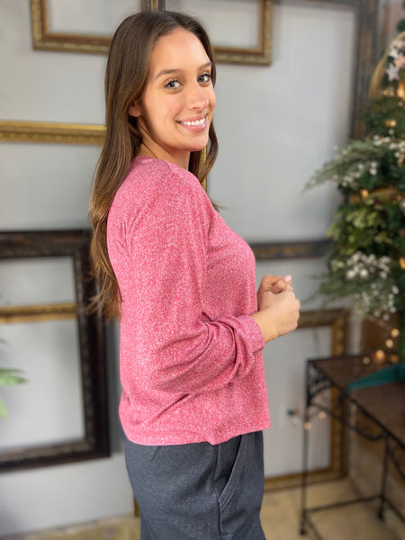 Side view of a dark red hacci knit long sleeve top