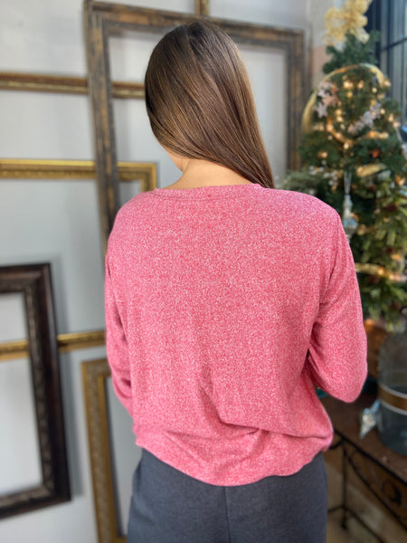 Back view of a dark red hacci knit long sleeve top