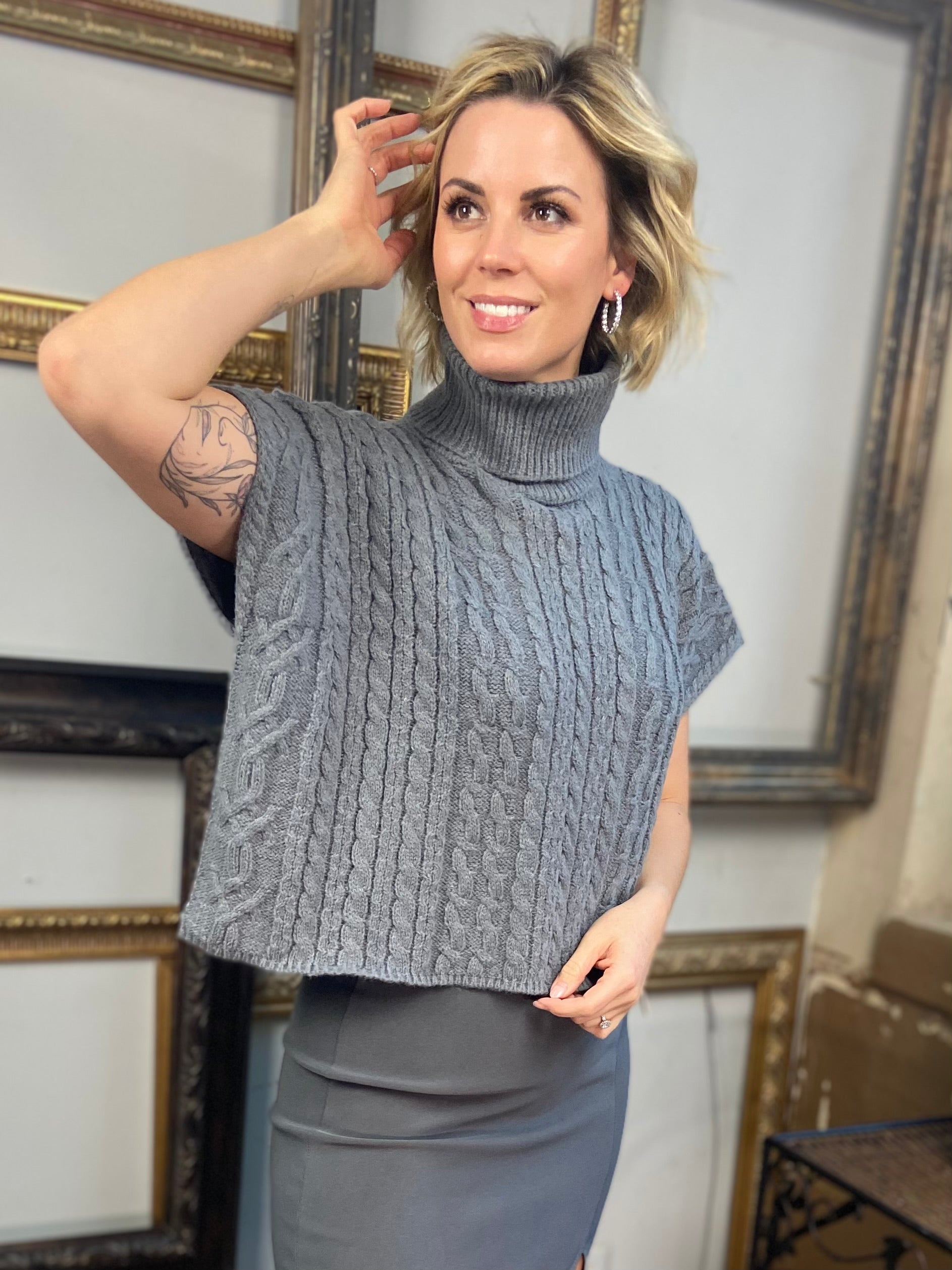 grey short sleeved cable knit sweater from Blu Pepper with a turtle neck
