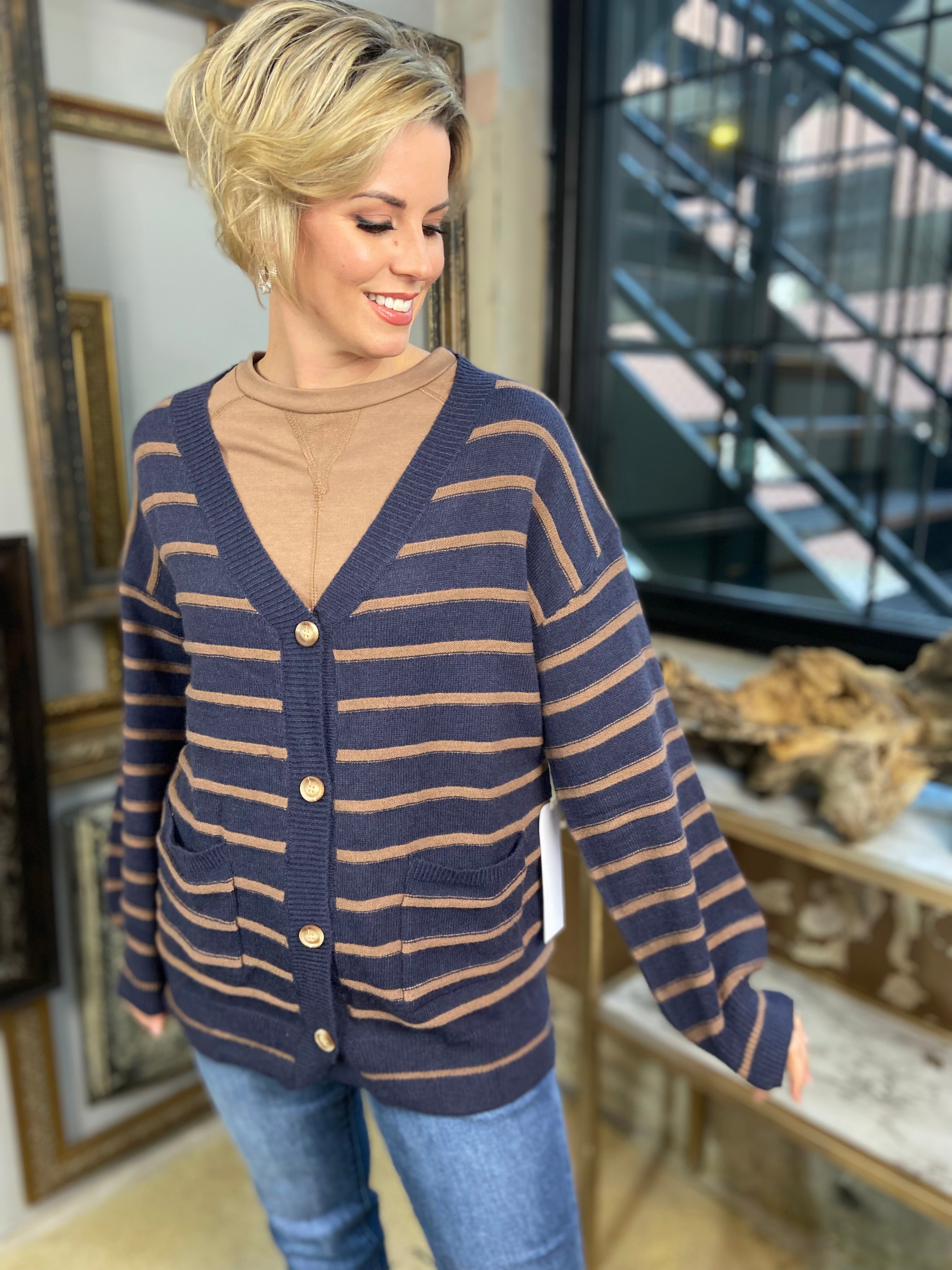 Navy and mocha striped cardigan sweater with button closure and pockets