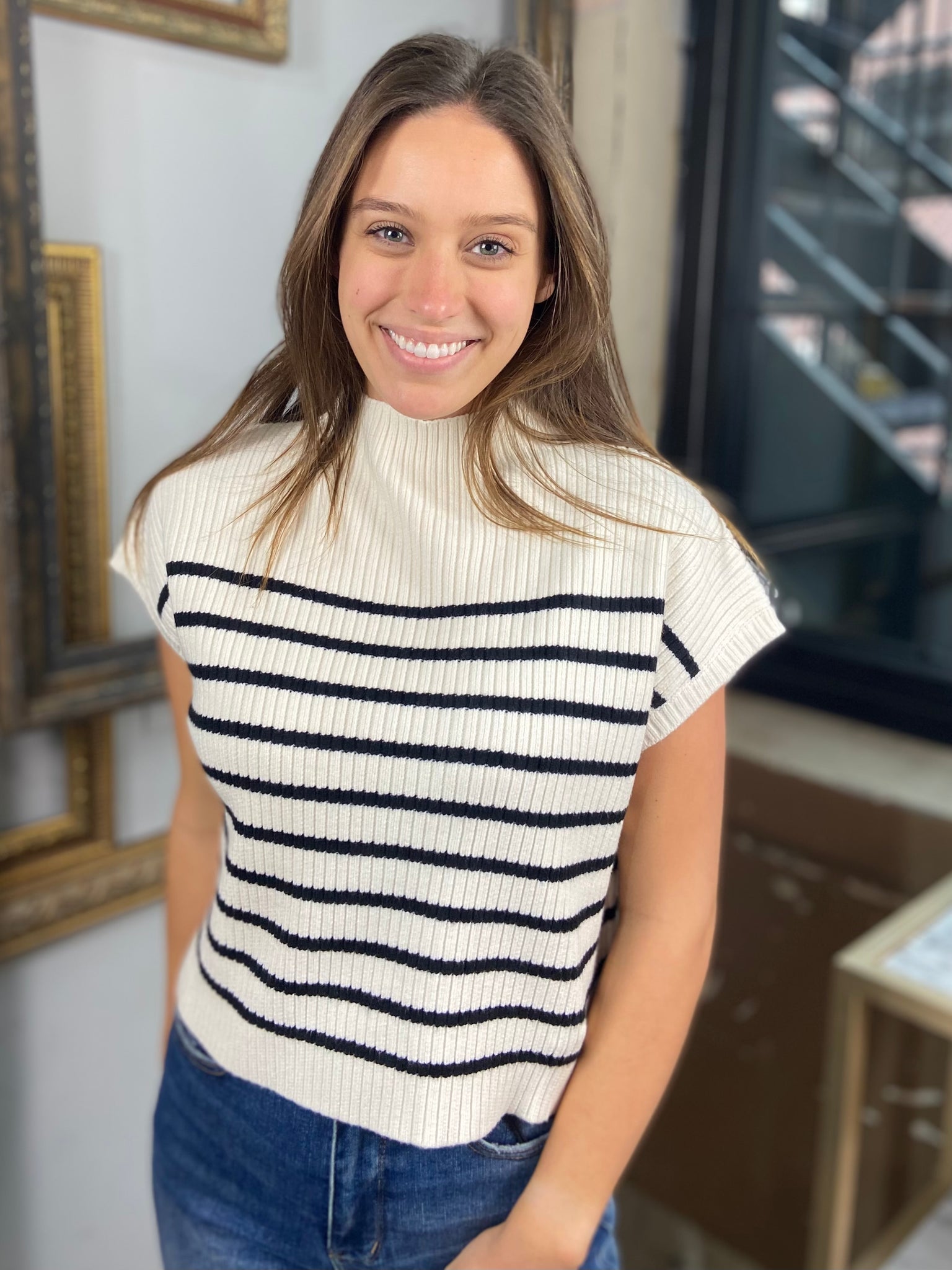 Black & white striped short sleeve sweater with mock neck from Blue Pepper paired with blue jeans