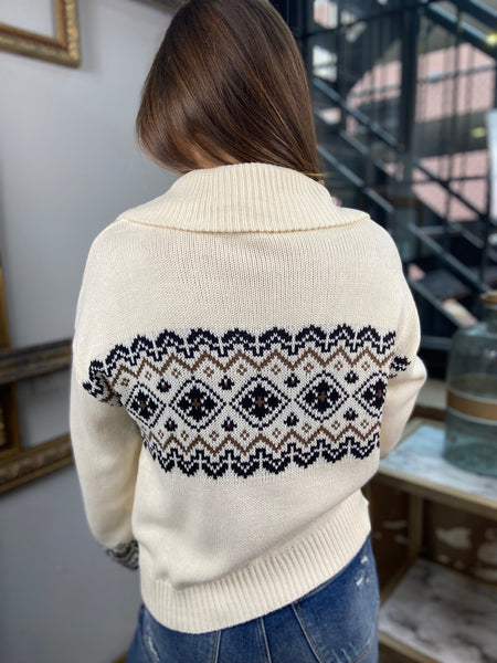 Back view of an ivory geometric design half zip sweater from Blu Pepper