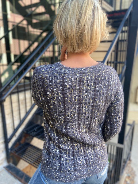 Back view of charcoal textured sweater