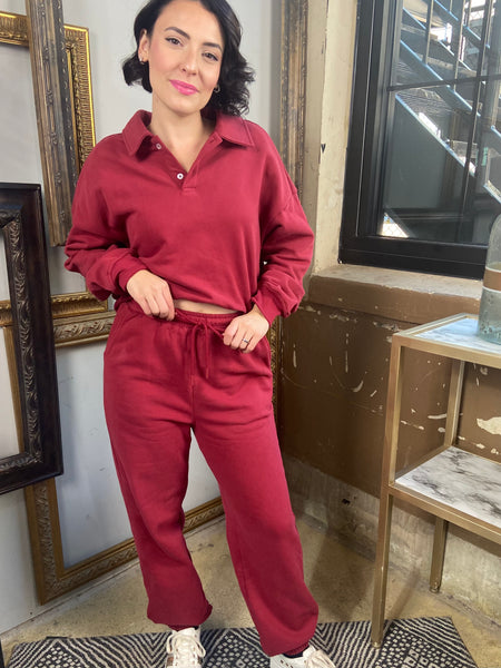 Burgundy polo style long sleeved sweatshirt with matching drawstring sweatpants