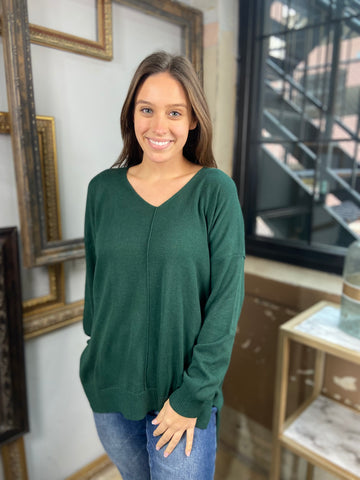 Dark green colored v neck sweater with front seam from Blu Pepper