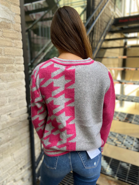 Back view of a Fuchsia & Gray hounds tooth sweater