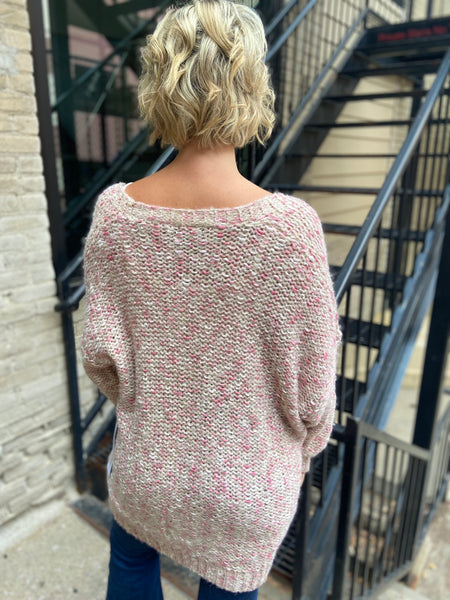 Back view of mauve cardigan sweater