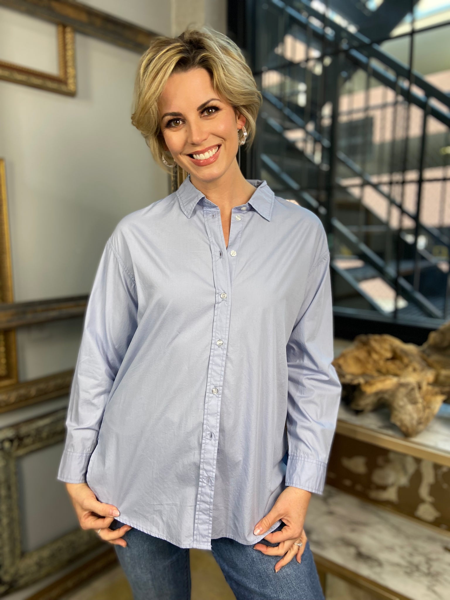 Light blue classic button down top with collar and long sleeves