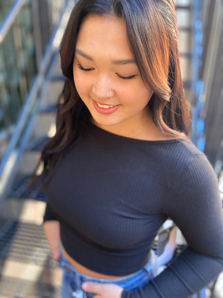 Close of View of Black ribbed fitted cropped top