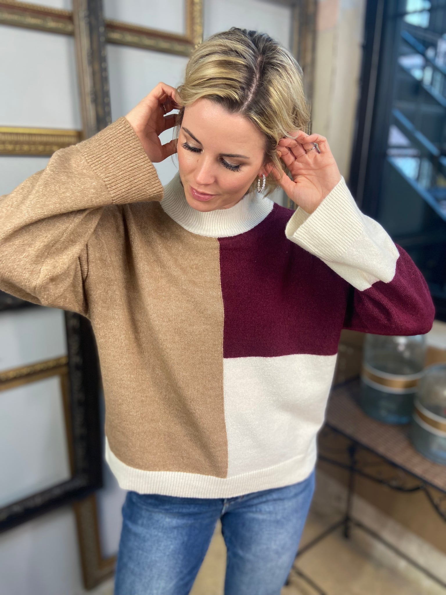 A brown, burgundy and ivory color block sweater from Blu Pepper