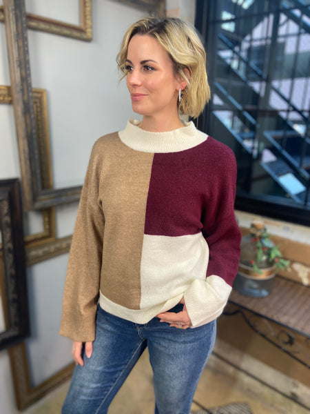 A brown, burgundy and ivory color block sweater from Blu Pepper