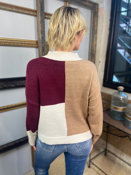 Back view of a brown, burgundy and ivory color block sweater from Blu Pepper