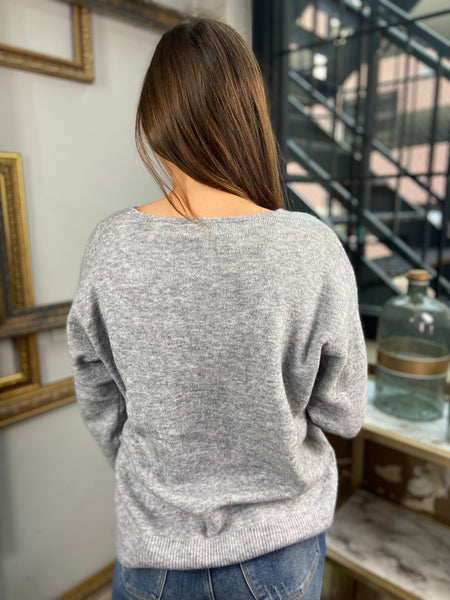 Back view of heather grey sweater from Be Cool paired with blue jeans